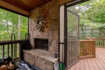 Main Level Screened In Porch with Wood Fireplace